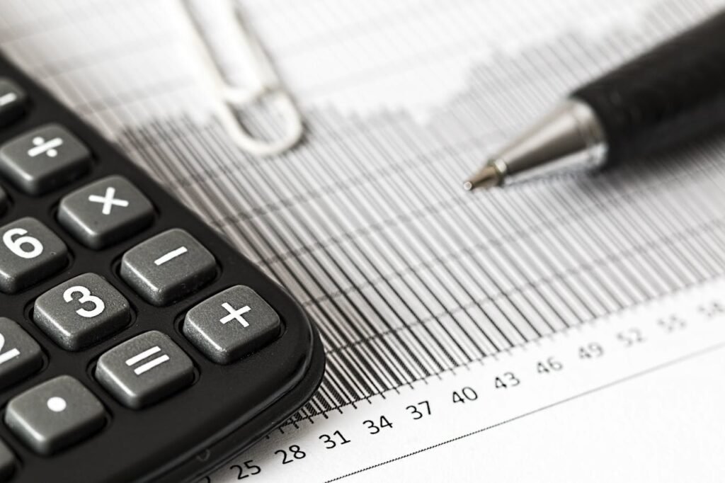 Student reviewing financial analytics and corporate statements in a lecture theatre